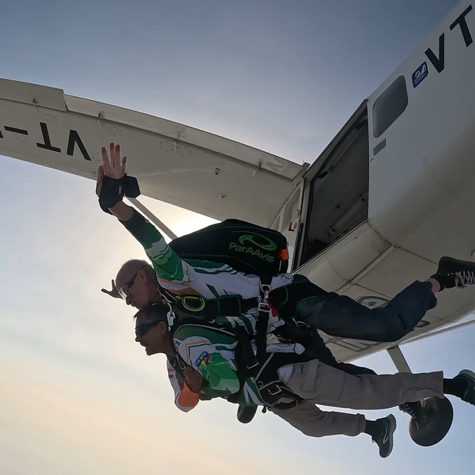 Tandem pair exiting the jump aircraft on a skydive over Abu Road, Rajasthan